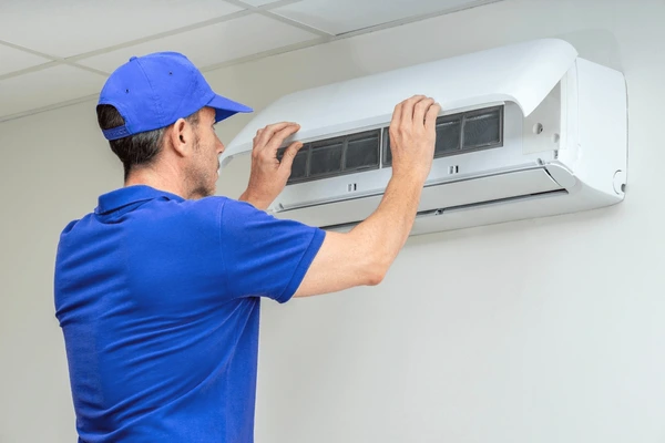 HVAC technician with equipment