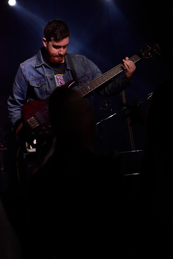 Tom playing bass